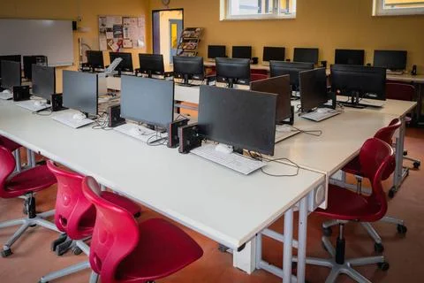 Many computers are in the computer cabinet in a school Stock Photos