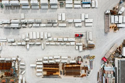 Many concrete blocks of different sizes stand in warehouses, the production o Stock-Fotos