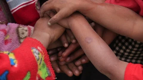 Many connecting poor children hands. Mrauk-U, Myanmar . Burma . Close up Stock Footage 63343018