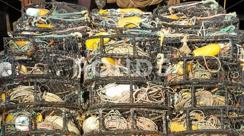 Many Crab cages stacked. Crab traps are used to bait, lure, and catch crabs f Stock Photos