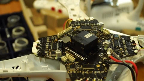Many crashed drone's cameras at quadrocopter service laboratory. Tracking shot. Stock Footage 86912271