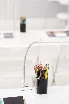 Many crayons with different colors. Back to school. Colored pencils in an gla Stock Photos