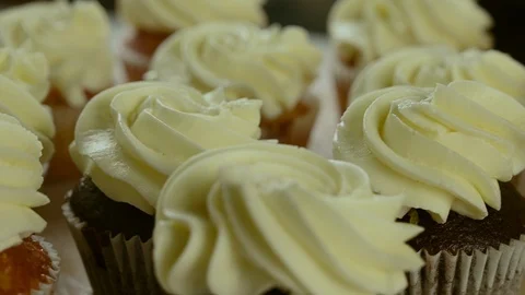 Many cupcakes spin on table Stock Footage 120401237
