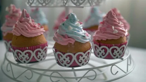 Many cupcakes spin on table Stock Footage 128758002
