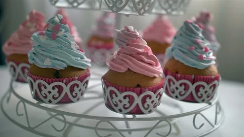 Many cupcakes spin on table Stock Footage 128758106