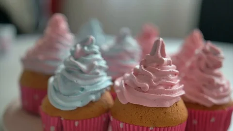 Many cupcakes spin on table Stock Footage 128758729