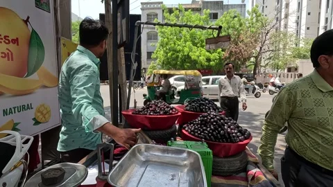 Many customers are buying java plum at java plum shop Stock Footage 277322834