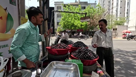 Many customers are buying java plum at java plum shop Stock Footage 277322841