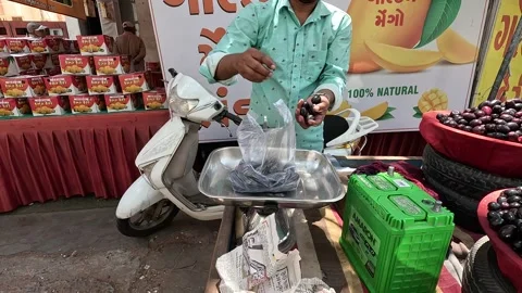 Many customers are buying java plum at java plum shop Stock Footage 277322857