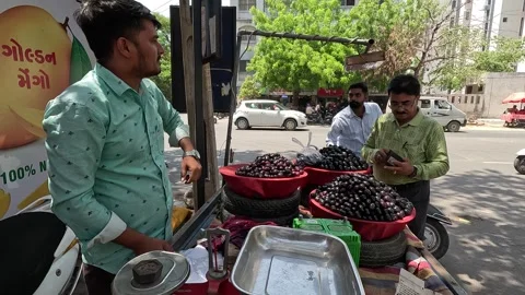Many customers are buying java plum at java plum shop Stock Footage 277322867