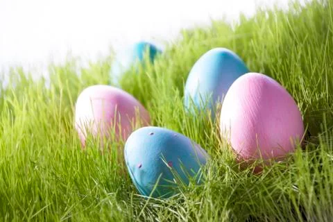 Many Decorative Easter Eggs On Green Grass Stock Photos