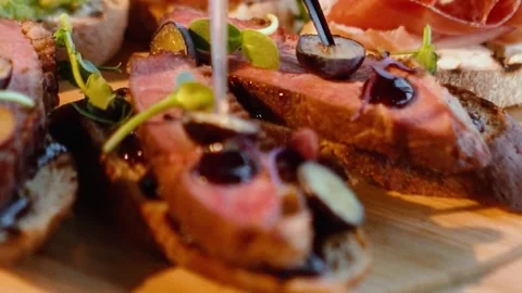 Many delicious dishes on the festive table, close-up Stock Footage 304518004