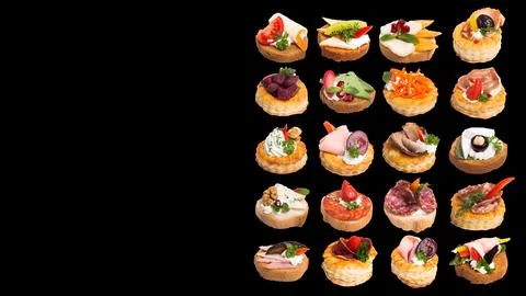 Many different canapes on a white background many different canapes on a blac Stock Photos
