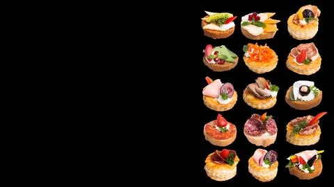 Many different canapes on a white background many different canapes on a blac Stock Photos