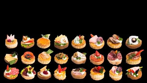 Many different canapes on a white background many different canapes on a blac Stock Photos