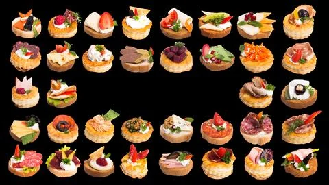 Many different canapes on a white background many different canapes on a blac Stock Photos