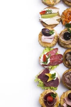 Many different canapes on a white background 写真素材