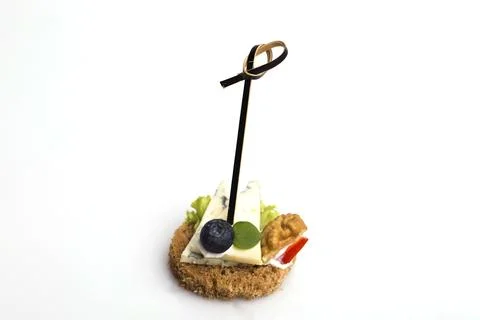 Many different canapes on a white background Foto stock