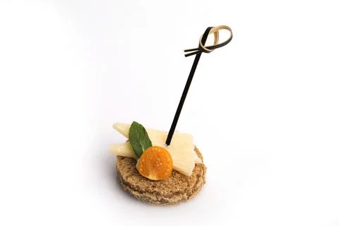 Many different canapes on a white background Stock Photos