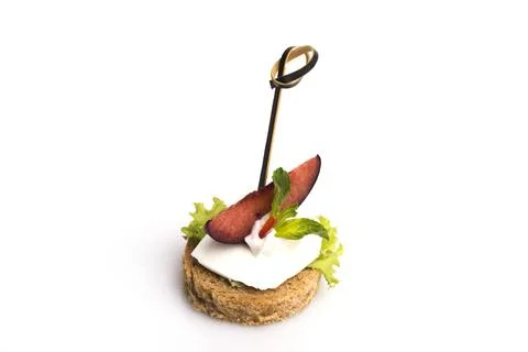 Many different canapes on a white background Stock Photos