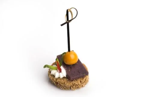 Many different canapes on a white background Stock Photos