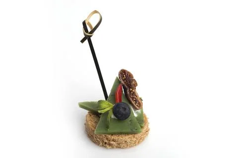 Many different canapes on a white background Stock Photos