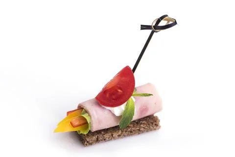 Many different canapes on a white background Stock Photos