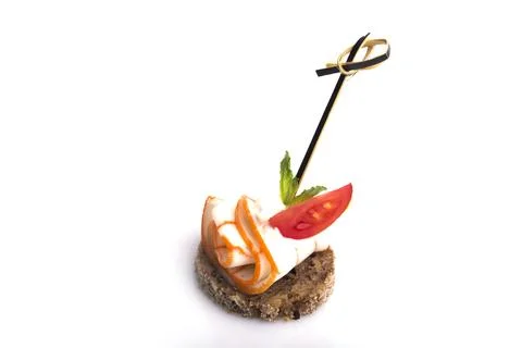 Many different canapes on a white background Stock Photos