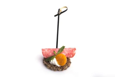 Many different canapes on a white background Stock Photos