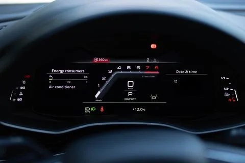 Many different car dashboard lights illuminated. Petrol meter on black Stock Photos