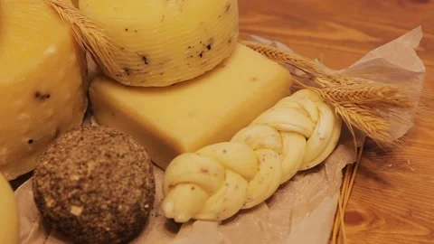 Many different cheeses are on the table. Stock Footage 130656379