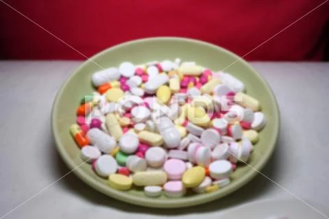 Many different color medicines. Out of focus. Stock Photos