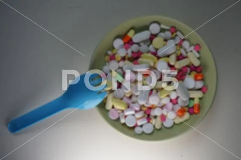 Many different color medicines. Out of focus. Stock Photos