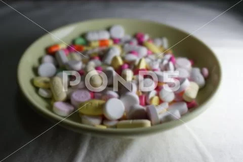 Many different color medicines. Out of focus. Stock Photos