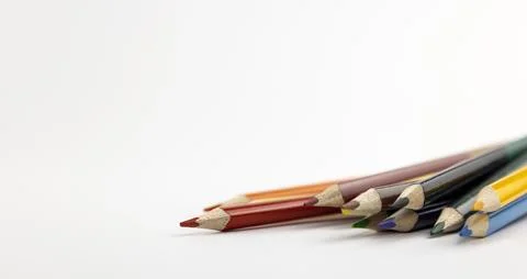 Many different colored pencils close-up isolated on white background. 库存照片