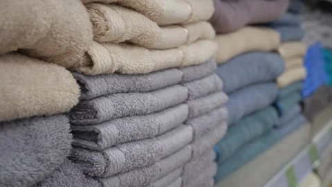 Many different colored towels folded into a stack. Stock Footage 309474464