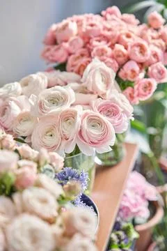 Many different flowers on Showcase. Background of mix of flowers. Beautiful Foto stock