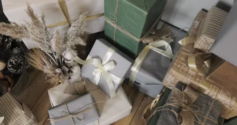 Many different gift boxes on floor under the Christmas tree in New Year time. Stock Footage 143859676