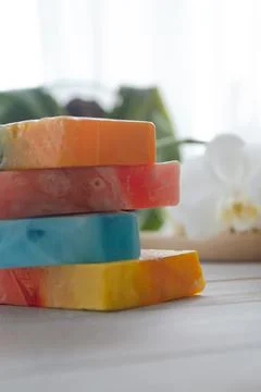 Many different handmade soap bars on shabby table, closeup Stock Photos