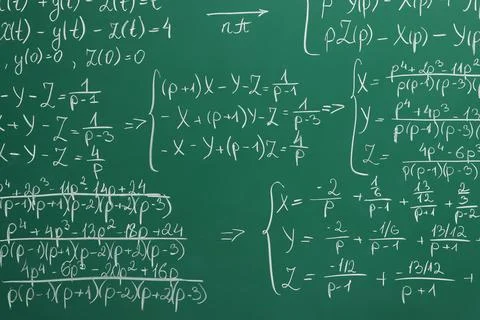 Many different math formulas written on chalkboard Stock Photos