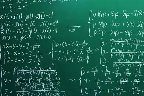 Many different math formulas written on chalkboard Stock Photos