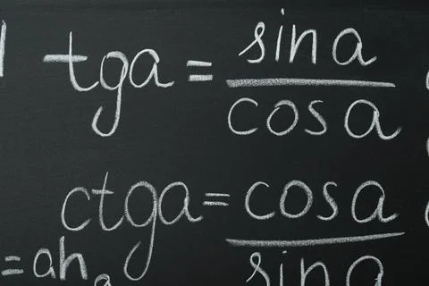 Many different math formulas written on chalkboard, closeup Stock Photos