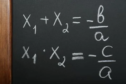 Many different math formulas written on chalkboard, closeup Stock Photos