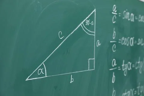 Many different math formulas written on chalkboard Stock Photos