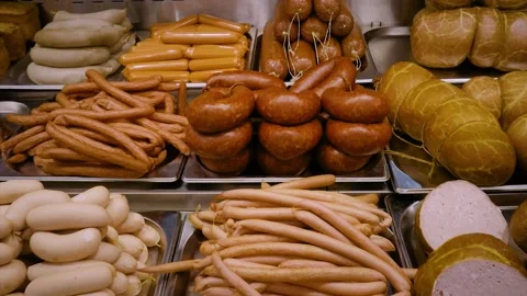 Many different meat products on the shelf in the supermarket. Semi-finished  Stock Footage 144053820