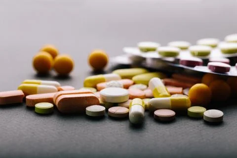 Many different medicines, tablets, tablets, capsules. Close-ups Stock Photos