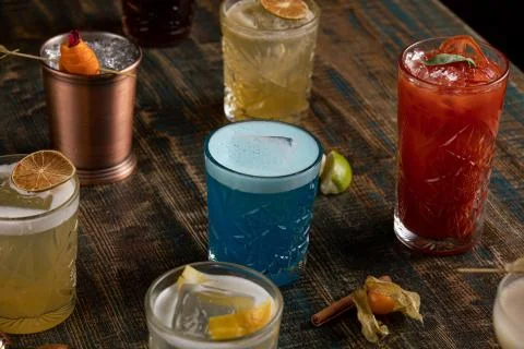 Many different multi-colored cocktails with different colors Stock Photos