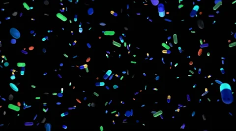 Many different multicolored drugs falling in black light (FULL HD) Stockbeeldmateriaal 47566702