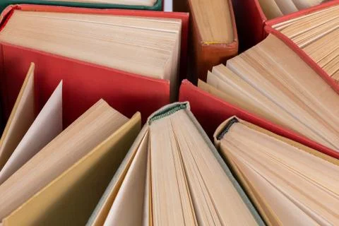 Many different old hardcover physical books close-up background with selective Фото
