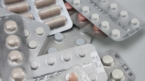 Many different pills tablet blister packages Stock Footage 81462413